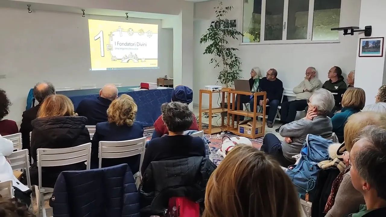 Partecipanti assistono a una presentazione intitolata “I Fondatori Divini – Una religione che evolve” durante l’evento Bahá’í a Bari per il 40º anniversario della Promessa della Pace Mondiale